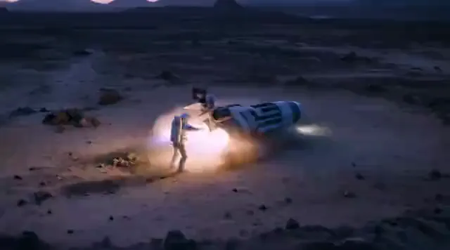 Video preview: Astronaut on an alien world — A lone astronaut stands on a dark alien landscape as glowing vapor drifts across the ground, viewed from a wide elevated camera.