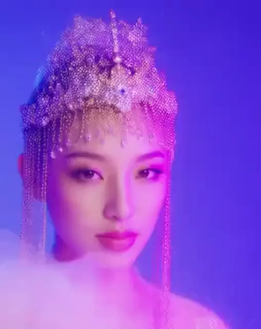 Video preview: Violet futuristic portrait — An adult female character wearing a luminous ornate headpiece, violet lighting and subtle cinematic portrait motion.